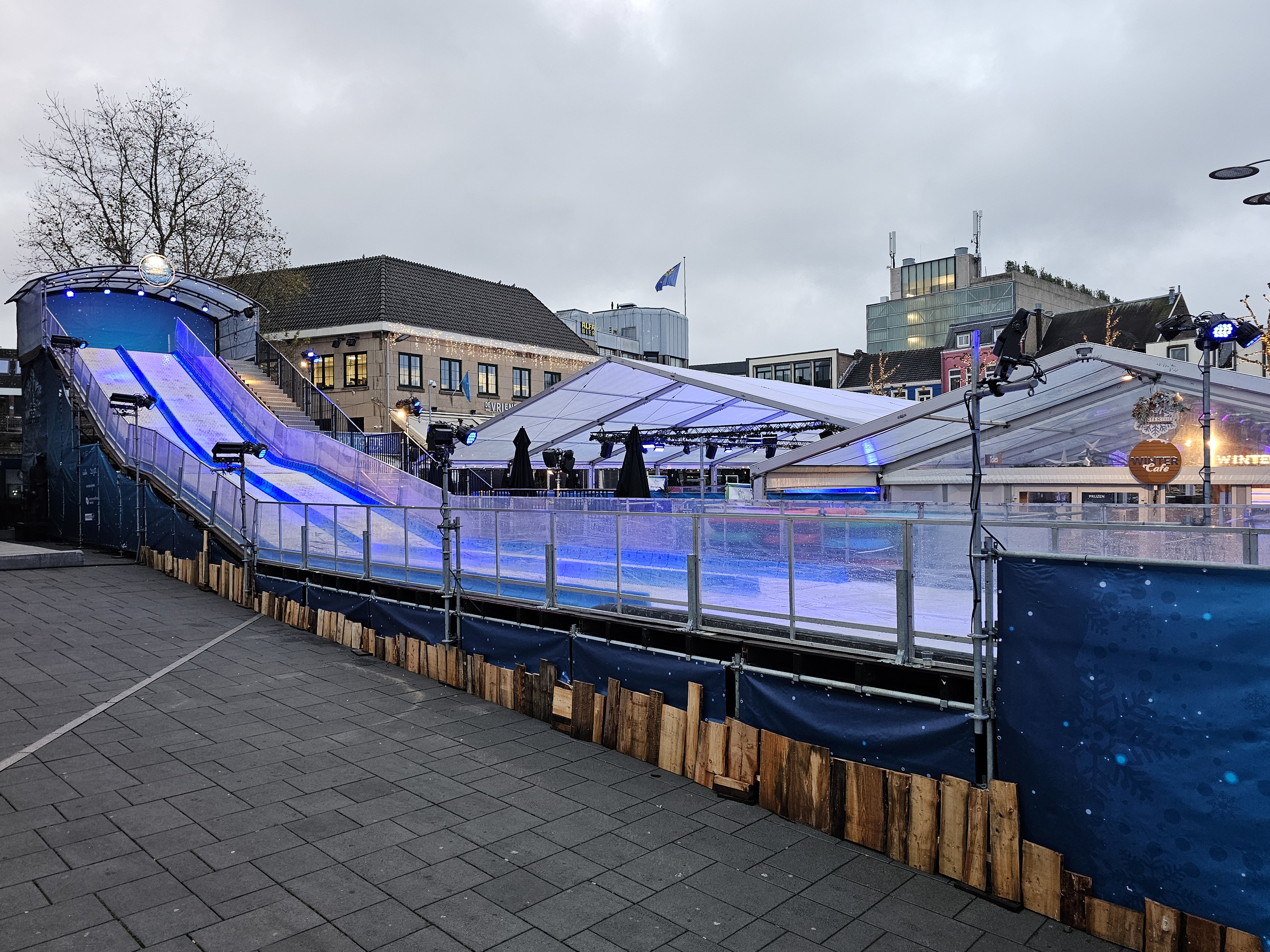 Photo showing blue Illuminated Slide at Christmas Fair after New Year in Heerlen